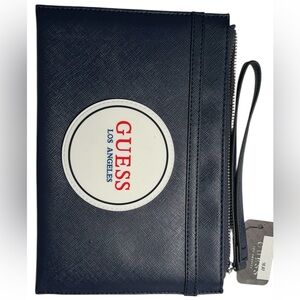 GUESS Los Angeles Navy Blue faux leather wristlet wallet.
